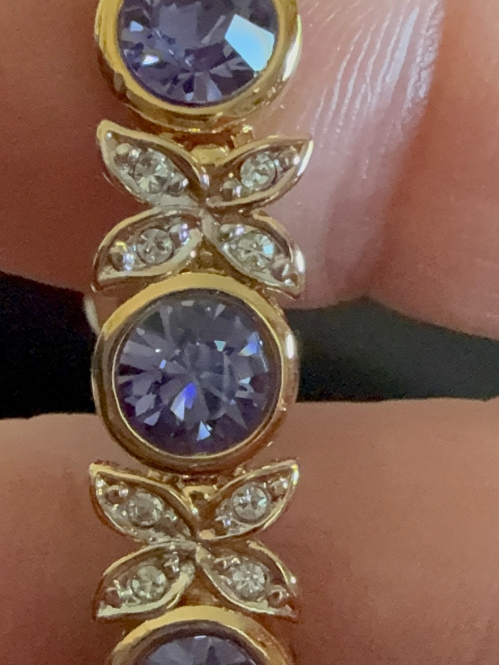 This D'Orlan gold-plated bracelet features amethyst-colored Swarovski crystals